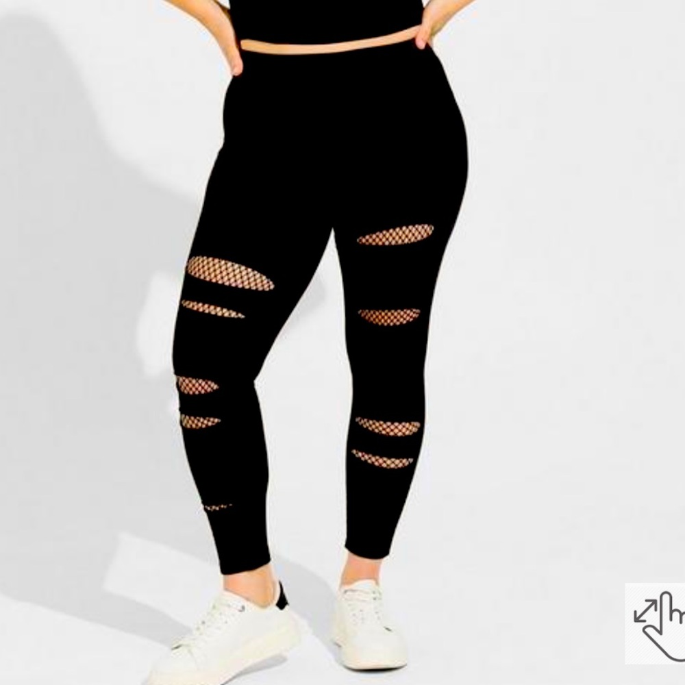 Torrid black ripped fish net leggings Size 3
